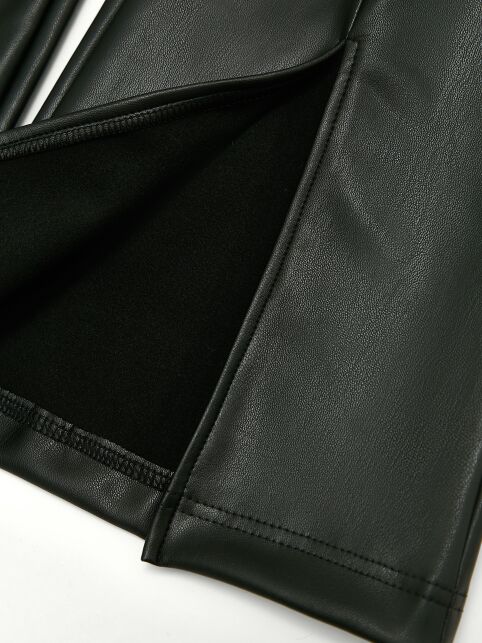 Брюки-клёш из экокожи с разрезами и рельефными швами LBK 3215 - купить в интернет-магазине Conte