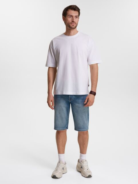 Джинсовые шорты с эффектом потёртостей CNM-15 Джинсовые шорты с эффектом потёртостей CNM-15 - купить в интернет-магазине Conte