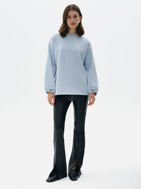 Брюки-клёш из экокожи с разрезами и рельефными швами LBK 3215 - купить в интернет-магазине Conte